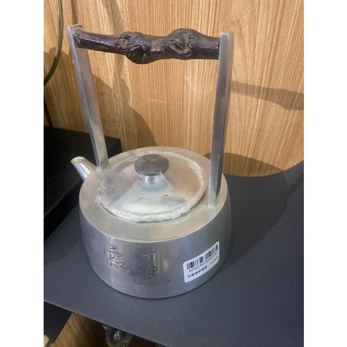 木缘提梁锡壶