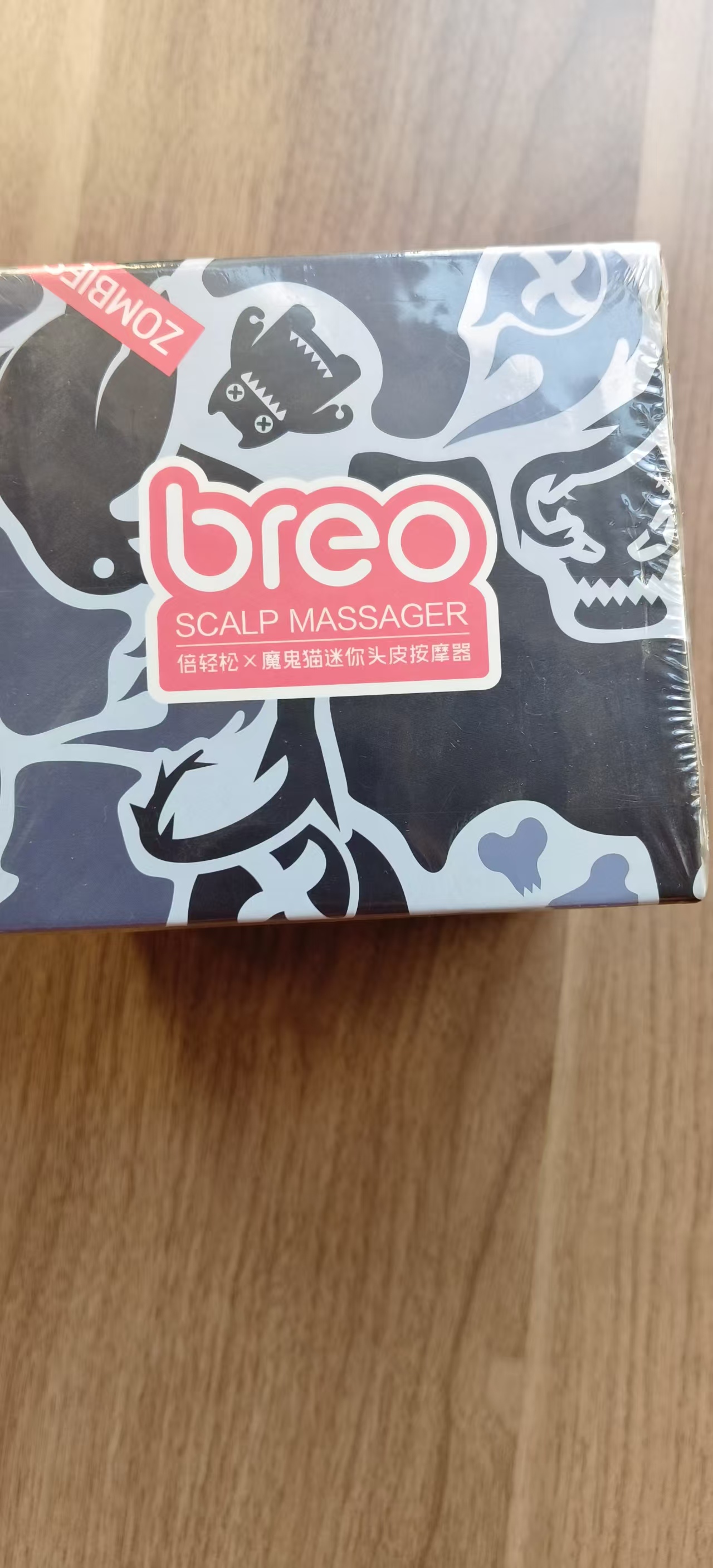 倍轻松头皮按摩仪魔鬼猫红色